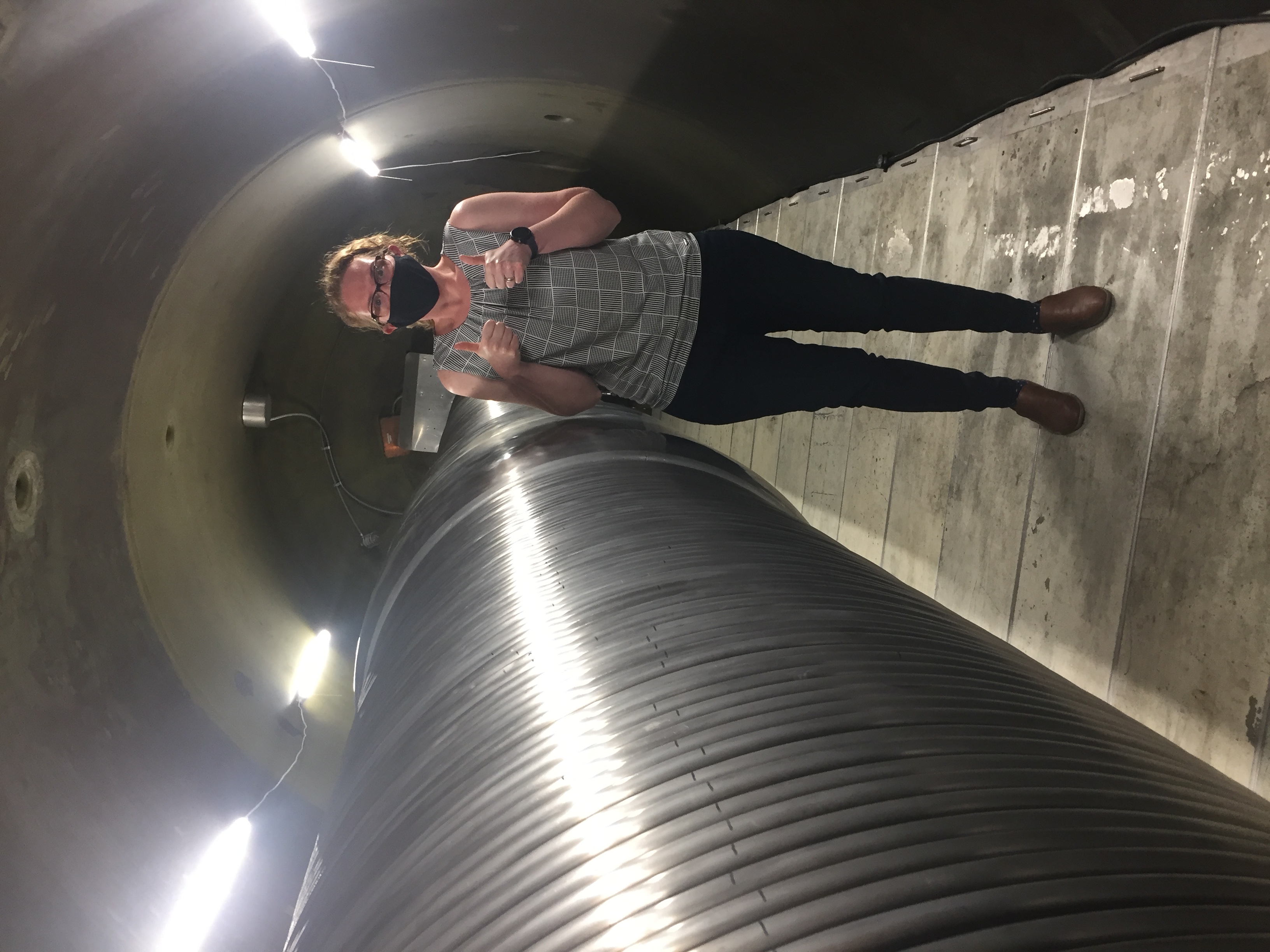Marissa Tremblay inside the tandem accelerator at PRIME lab, the Purdue University AMS.